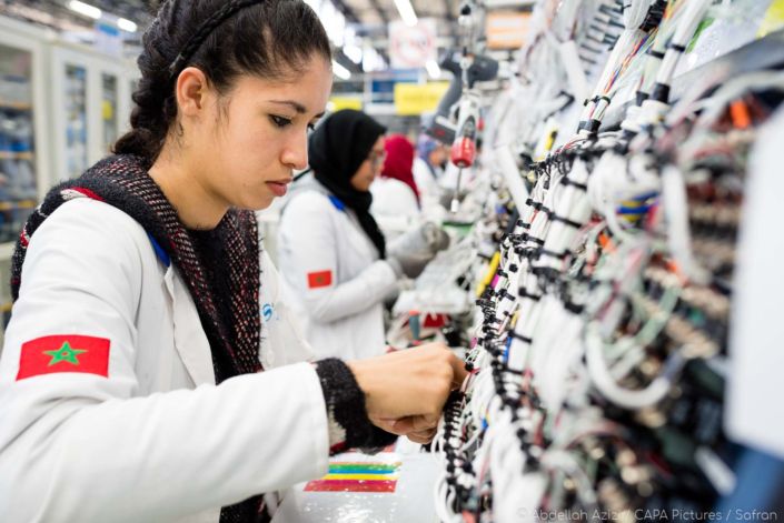 Aerospace factory young woman working