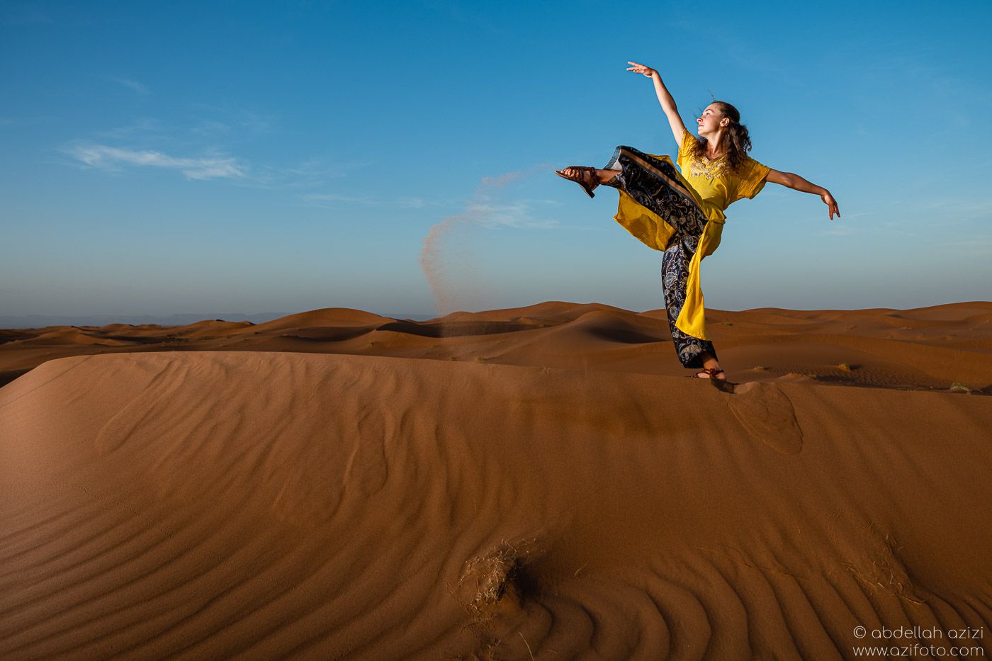 Desert dancer in sand sundes